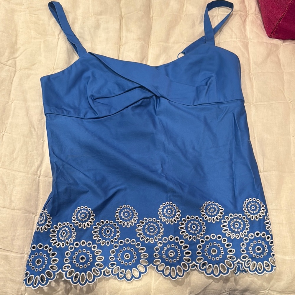 Blue Sleeveless Blouse with Floral Hem
